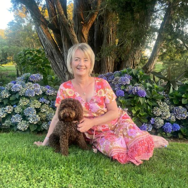 Natasha in garden with dog